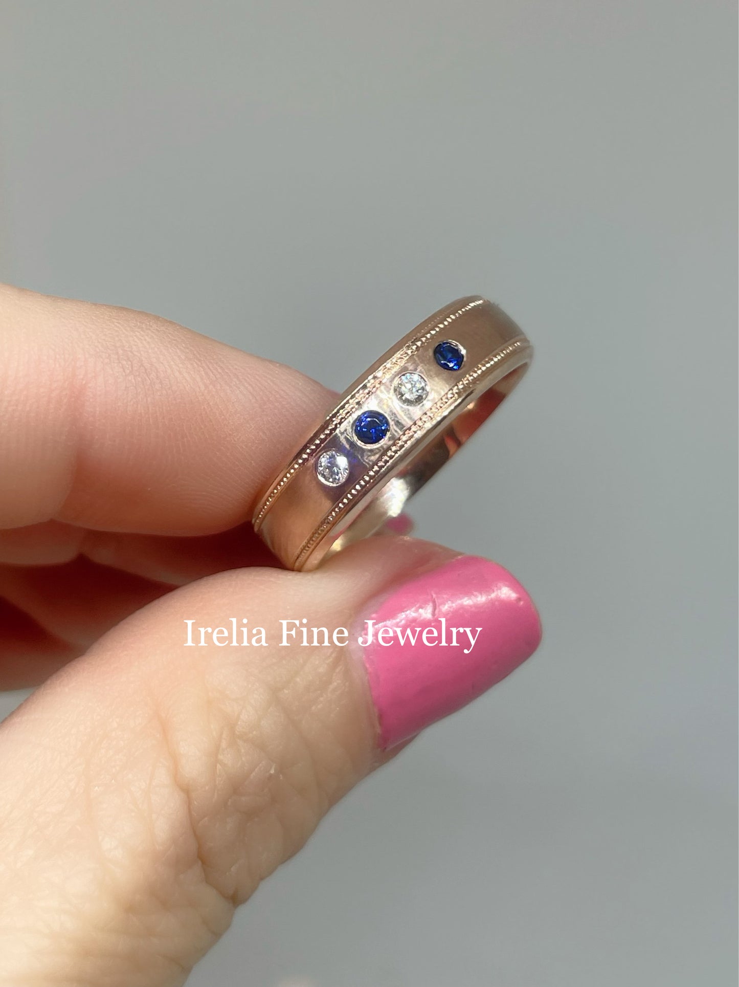 Custom 14k Rose Gold Wedding Band with Natural Blue Sapphires and Diamonds